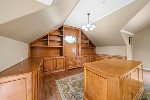 a view of a hallway with washer and dryer