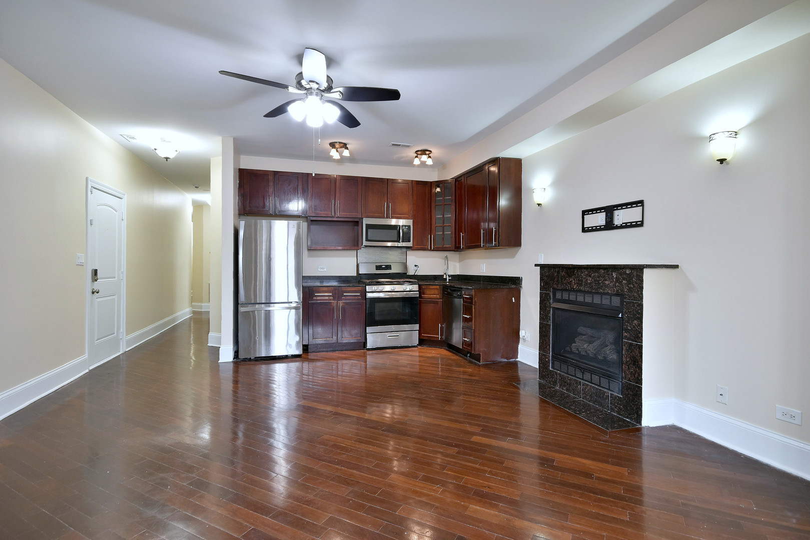 4819 South Prairie Avenue, Unit 1 Chicago, IL 60615 - Photo 2 of 16 a view of kitchen with cabinets and wooden floor