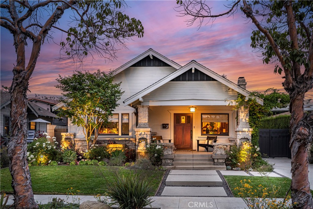 310 Loma Avenue Long Beach, CA 90814 - Photo 1 of 71 a front view of a house with a yard