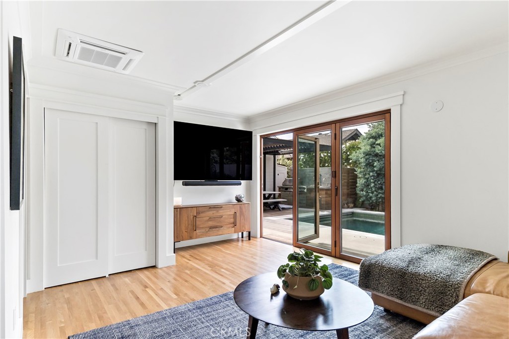 310 Loma Avenue Long Beach, CA 90814 - Photo 32 of 71 a living room with furniture and a flat screen tv