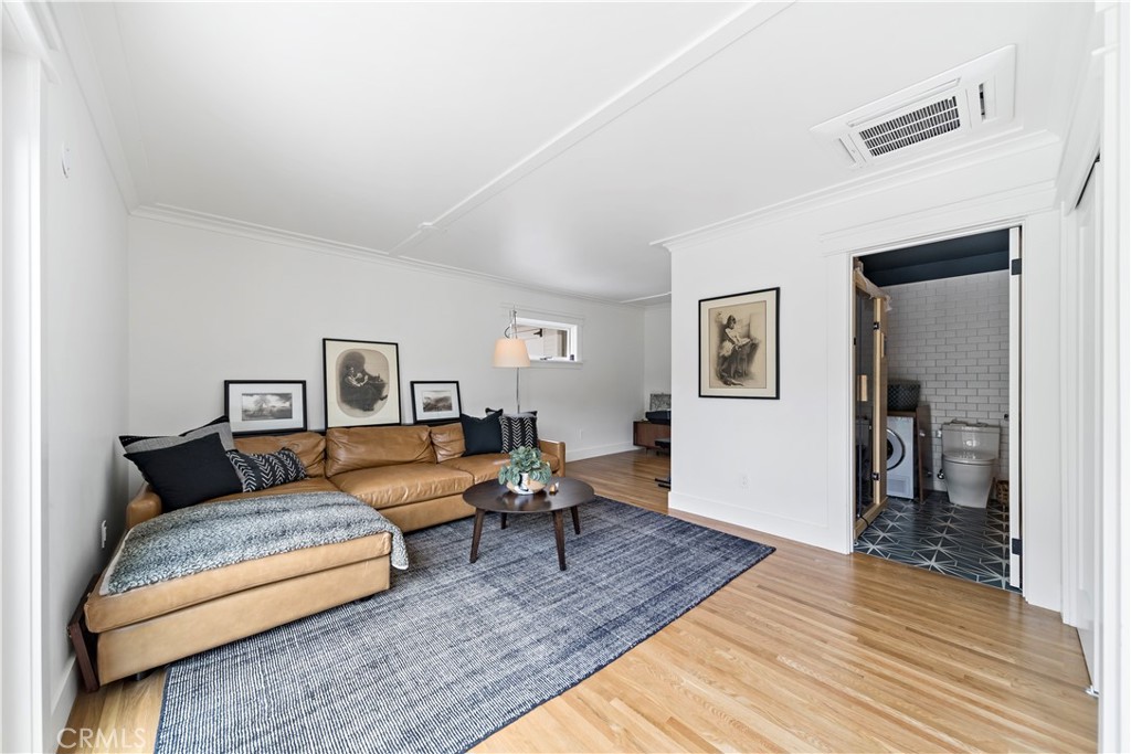 310 Loma Avenue Long Beach, CA 90814 - Photo 33 of 71 a living room with furniture and a wooden floor