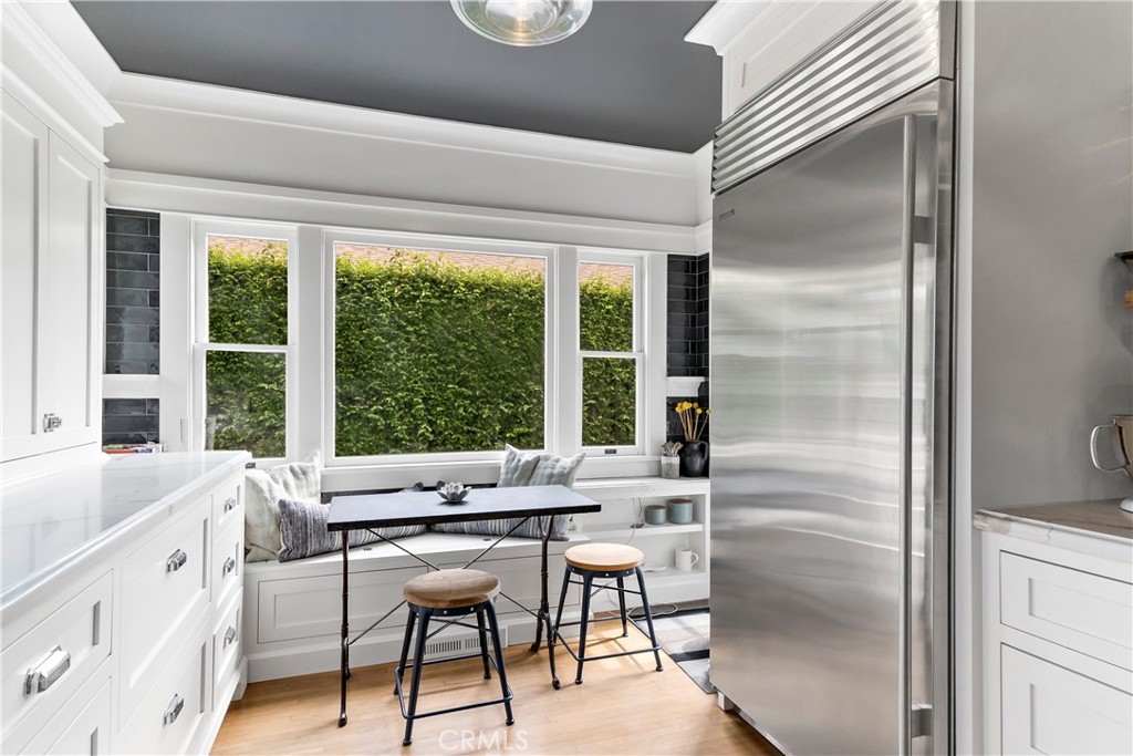 310 Loma Avenue Long Beach, CA 90814 - Photo 7 of 71 a view of a dining room with furniture window and outside view