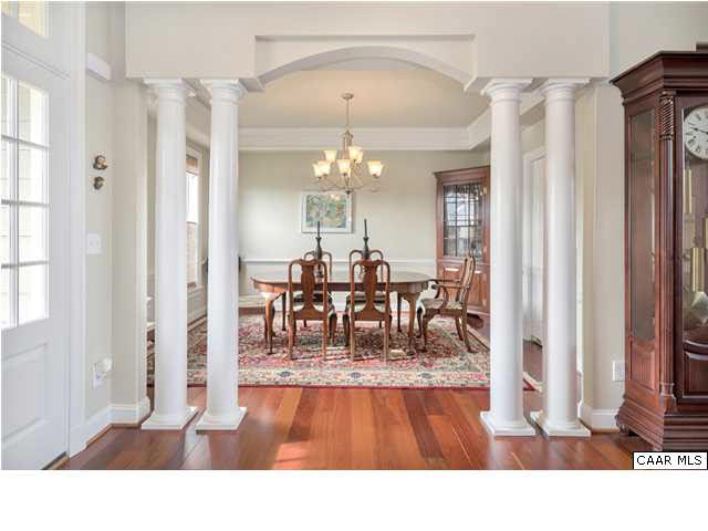 5346 Raven Stone Road Crozet, VA 22932 - Photo 11 of 25 a living room with furniture and a chandelier