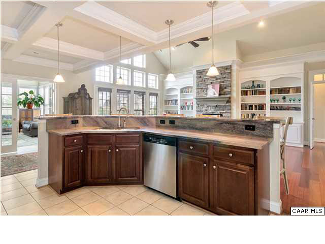 5346 Raven Stone Road Crozet, VA 22932 - Photo 15 of 25 a kitchen with a sink stove and cabinets