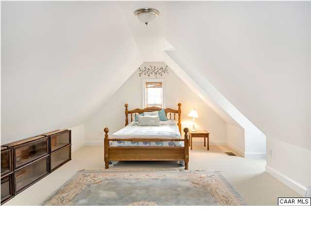 5346 Raven Stone Road Crozet, VA 22932 - Photo 24 of 25 a bedroom with a bed and a cabinets