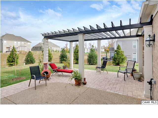 5346 Raven Stone Road Crozet, VA 22932 - Photo 7 of 25 a outdoor living space with furniture and garden view