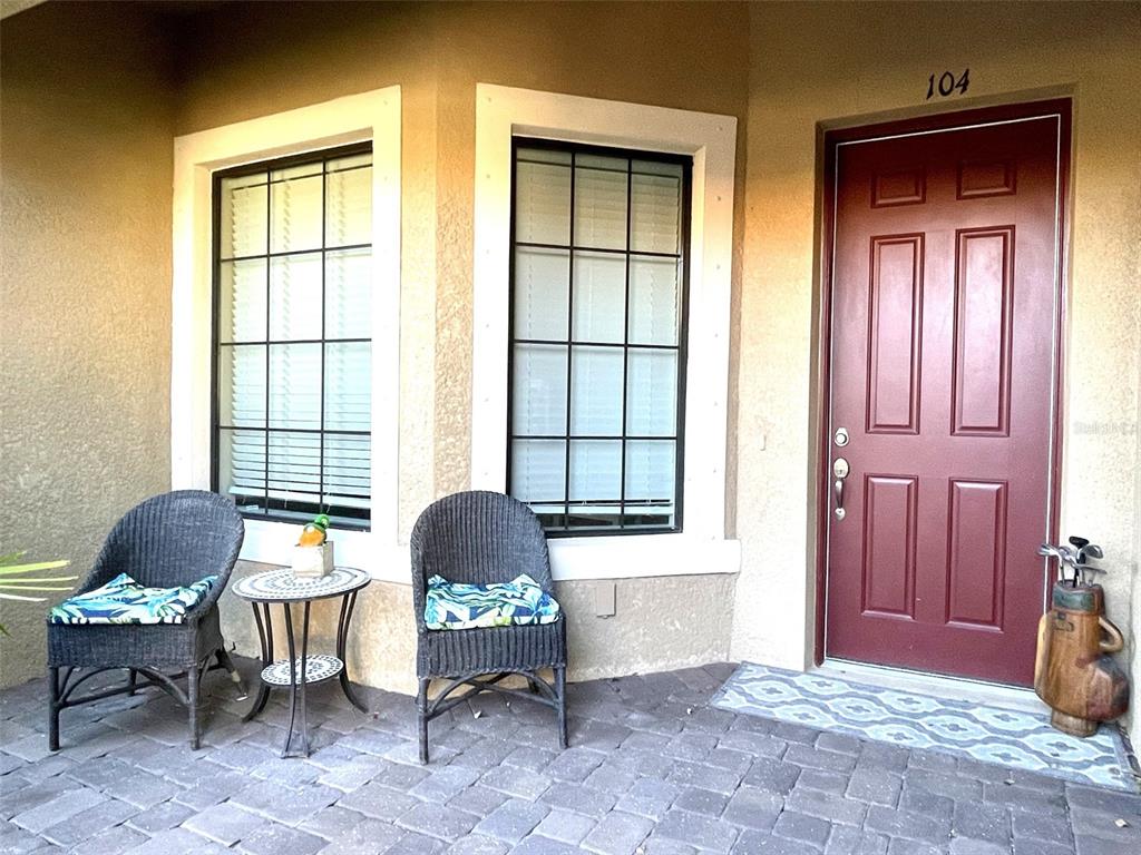 13710 Messina Loop, Unit 104 Bradenton, FL 34211 - Photo 1 of 1 a living room with furniture and a window