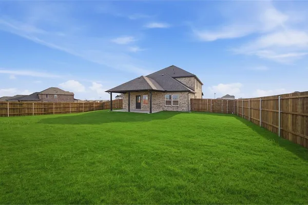a view of a garden with a small yard