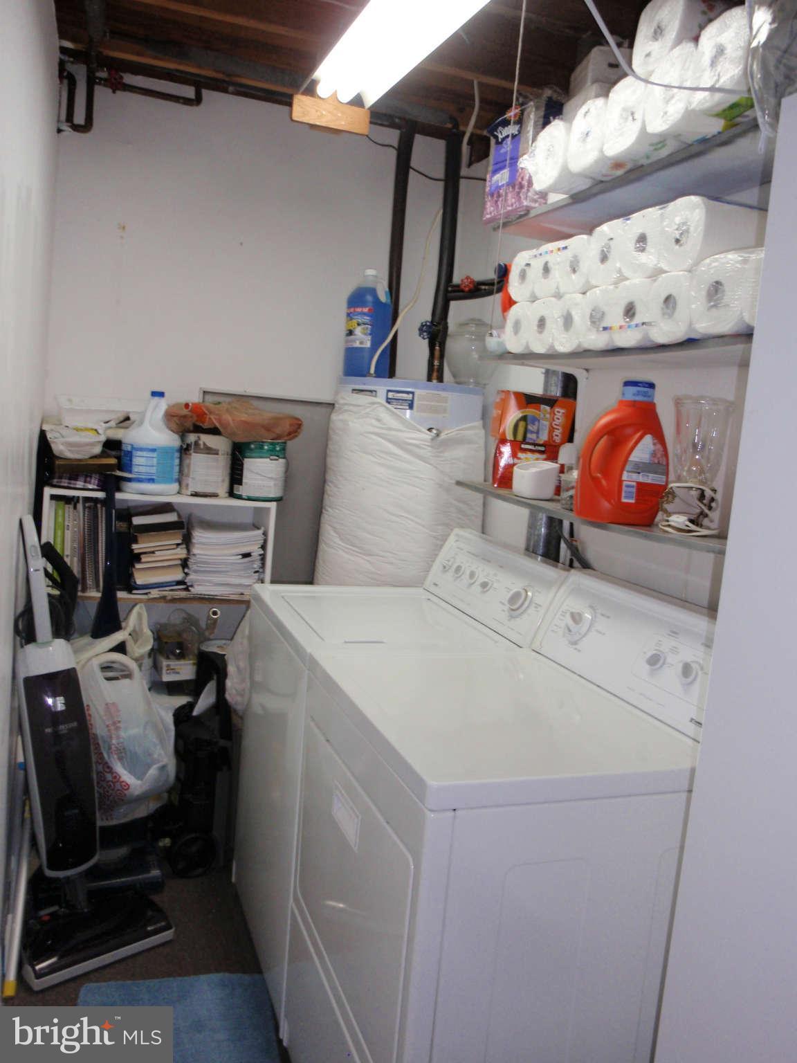 12139 Purple Sage Court Reston, VA 20194 - Photo 15 of 21 a utility room with dryer and washer