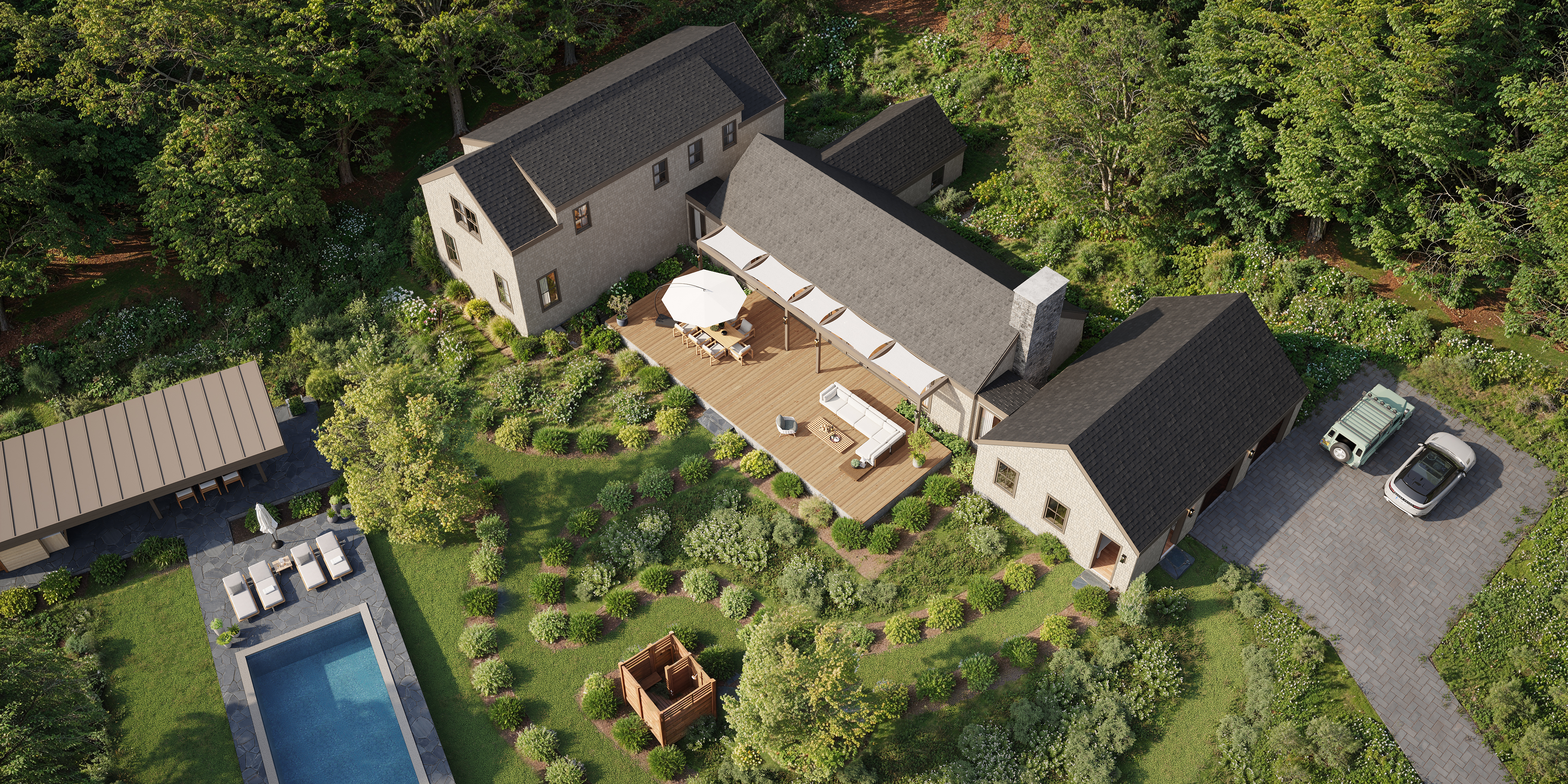 an aerial view of a house with a yard and garden