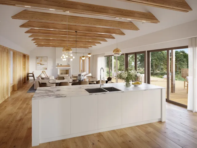 a view of living room with stainless steel appliances granite countertop furniture and a chandelier