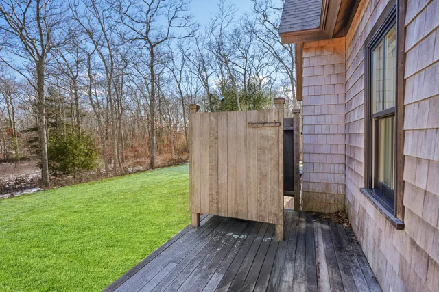 a view of a backyard of the house
