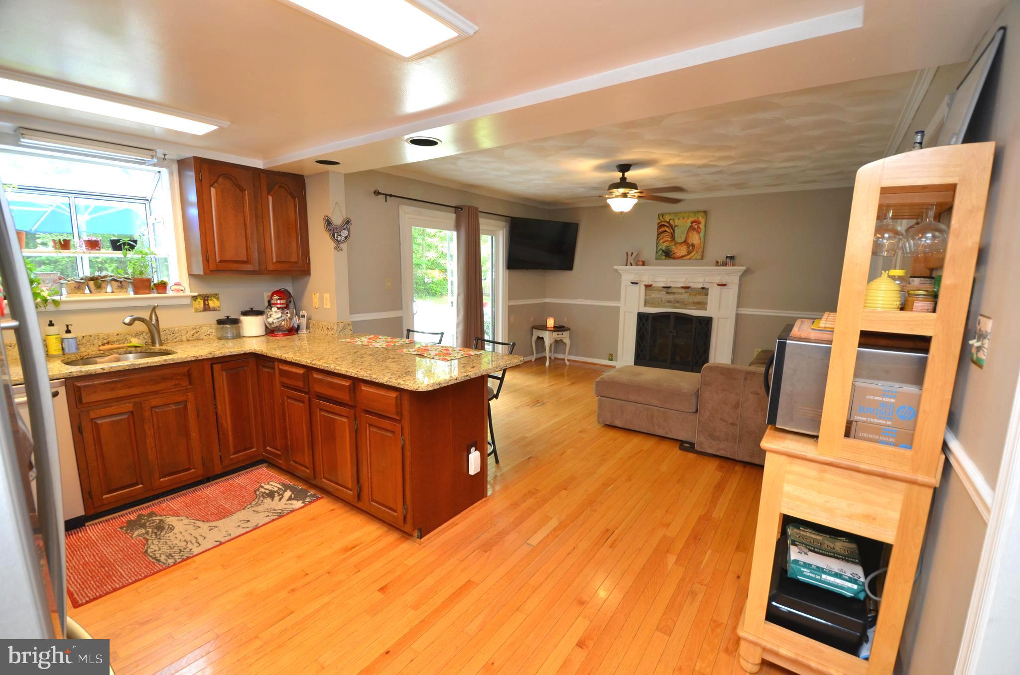 1527 Snug Harbor Road Shady Side, MD 20764 - Photo 4 of 39 Kitchen with hardwood floors