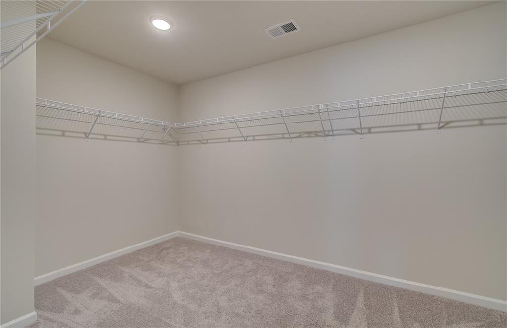 2713 Riverpine Trail Atlanta, GA 30331 - Photo 14 of 15 a view of a room with racks on the wall