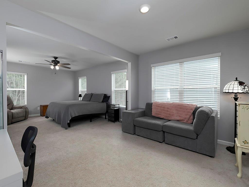 371 Highgrove Circle Dallas, GA 30157 - Photo 4 of 20 a living room with furniture and a window