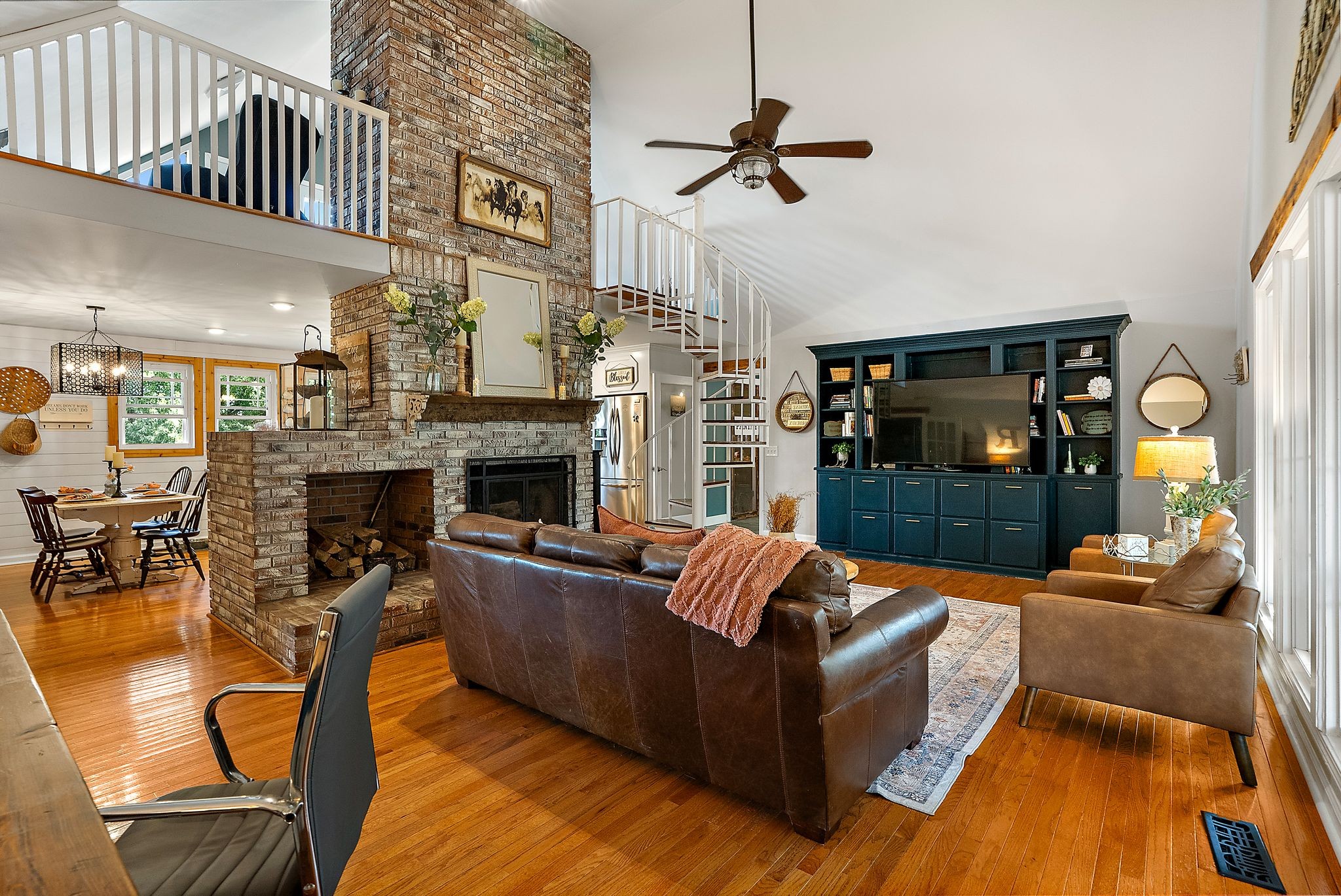 1633 Saundersville Road Hendersonville, TN 37075 - Photo 11 of 71 a living room with furniture and a fireplace