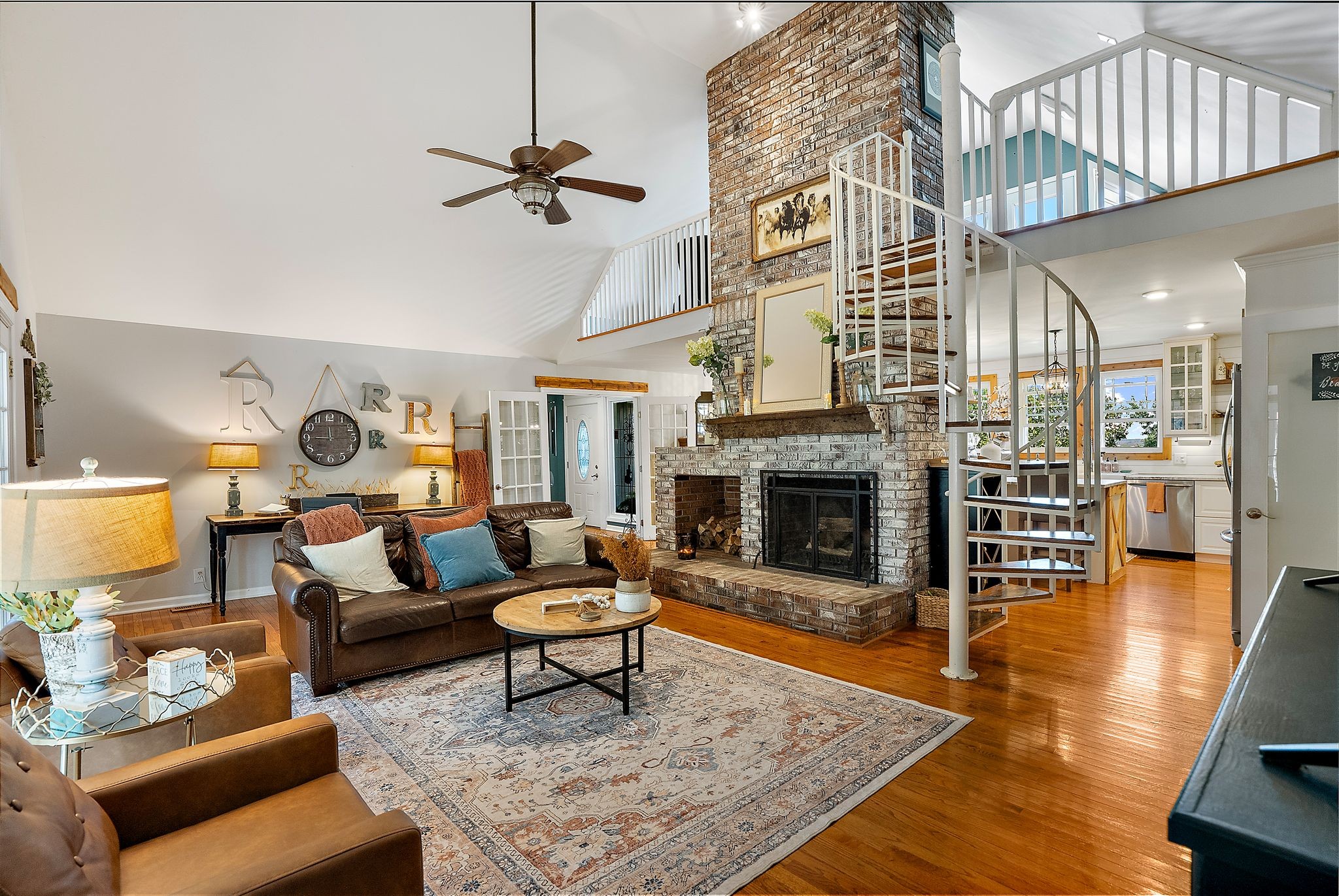 1633 Saundersville Road Hendersonville, TN 37075 - Photo 12 of 71 a living room with furniture and a fireplace