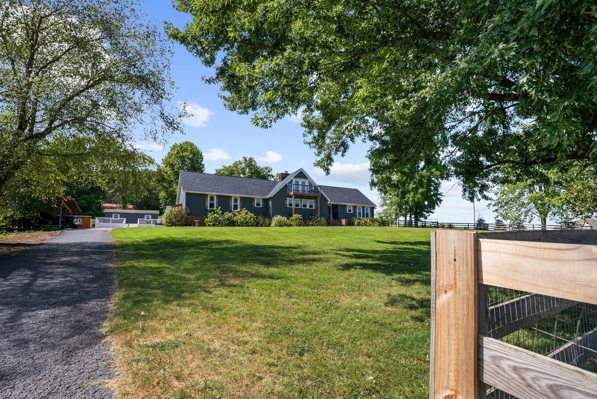1633 Saundersville Road Hendersonville, TN 37075 - Photo 5 of 71 a front view of house with yard and trees