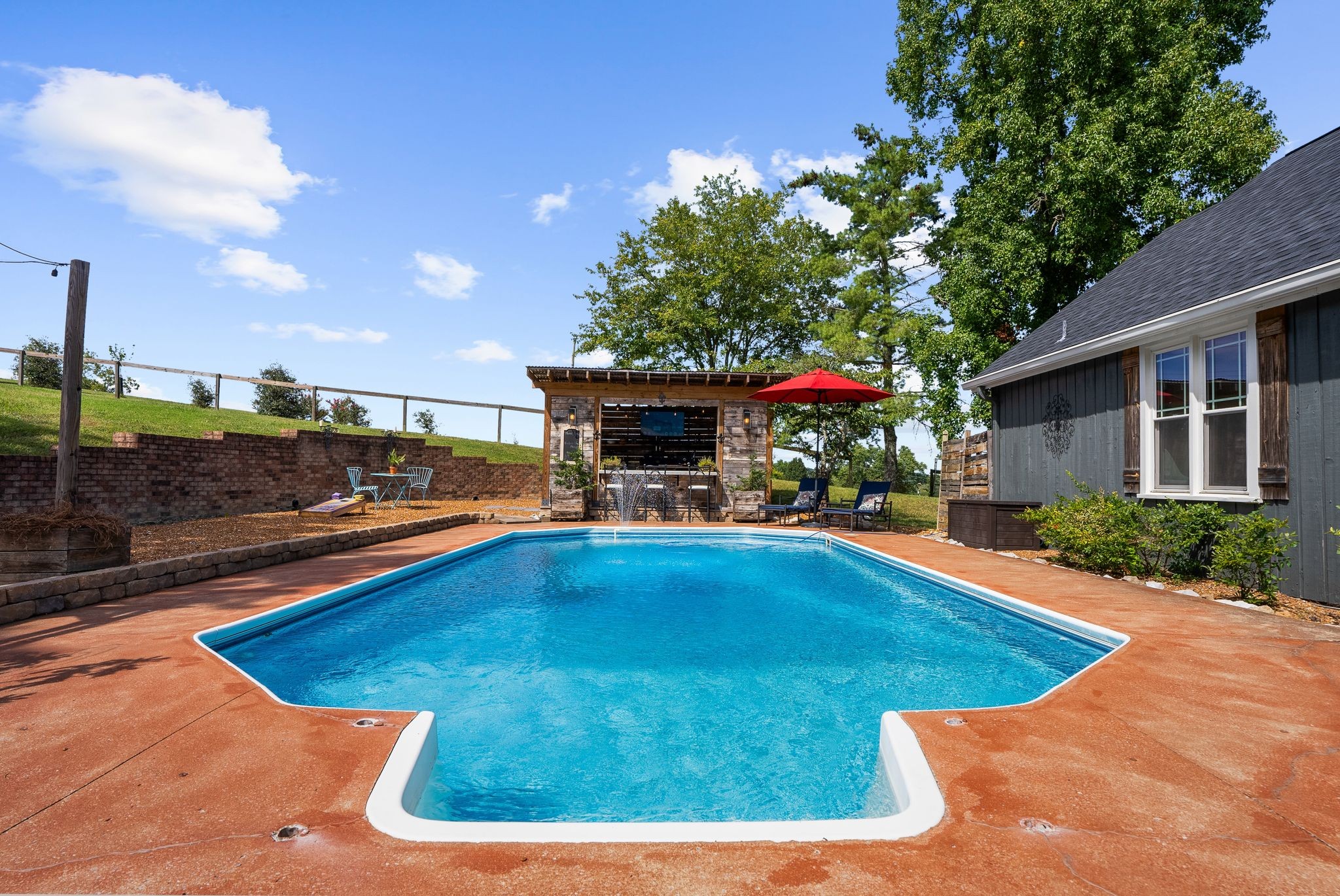1633 Saundersville Road Hendersonville, TN 37075 - Photo 52 of 71 a view of a swimming pool with an outdoor seating