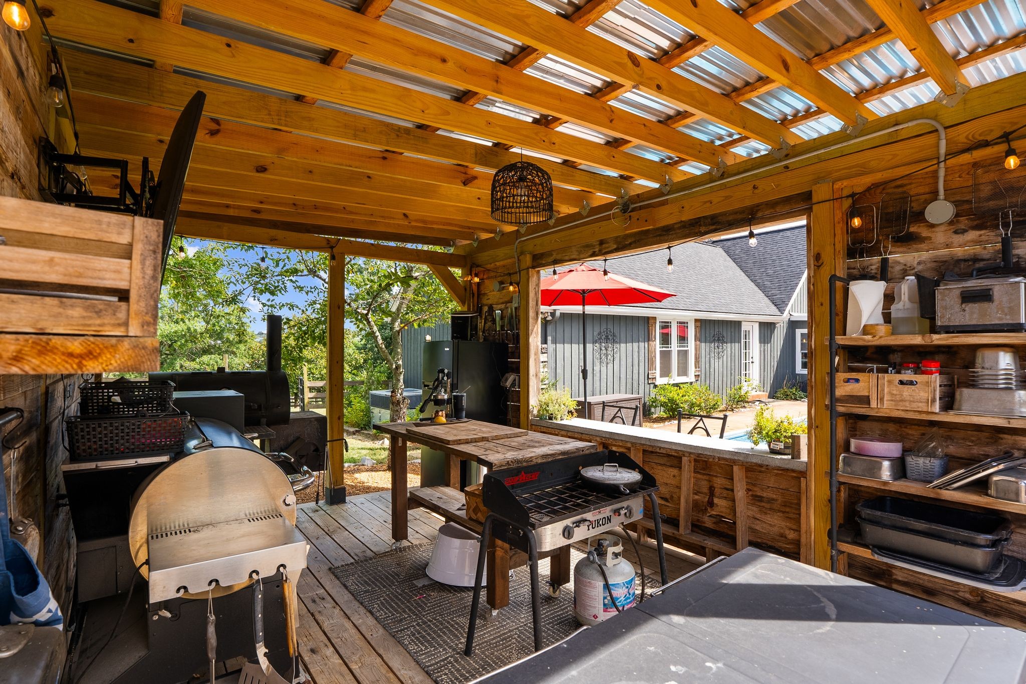 1633 Saundersville Road Hendersonville, TN 37075 - Photo 54 of 71 a view of a patio with table and chairs and potted plants