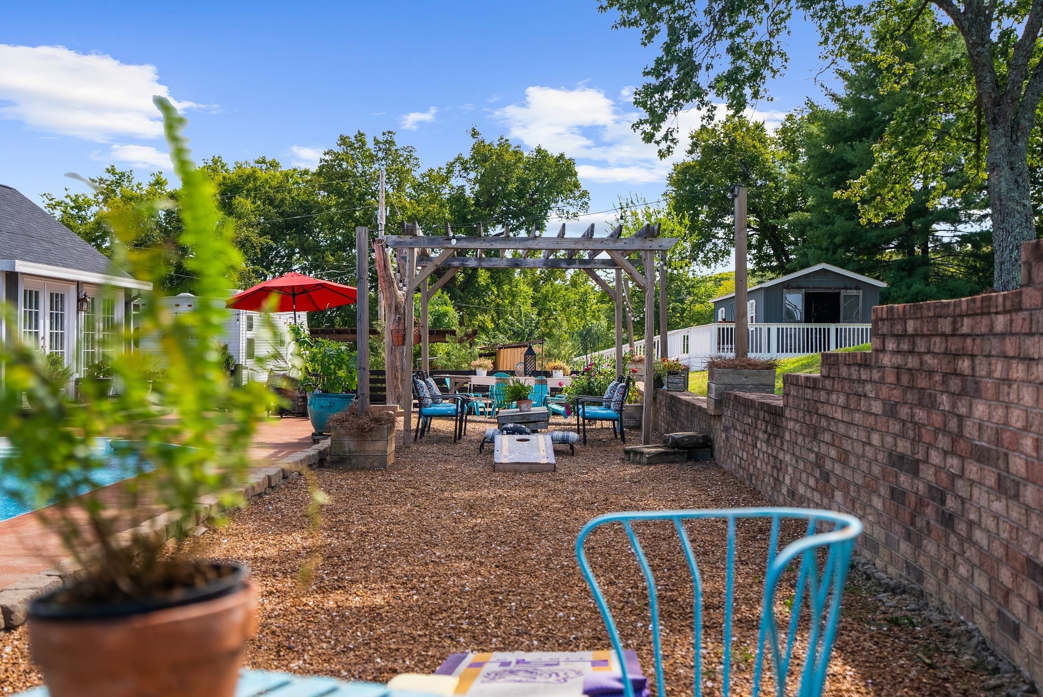 1633 Saundersville Road Hendersonville, TN 37075 - Photo 56 of 71 a backyard of a house with lots of green space and fountain