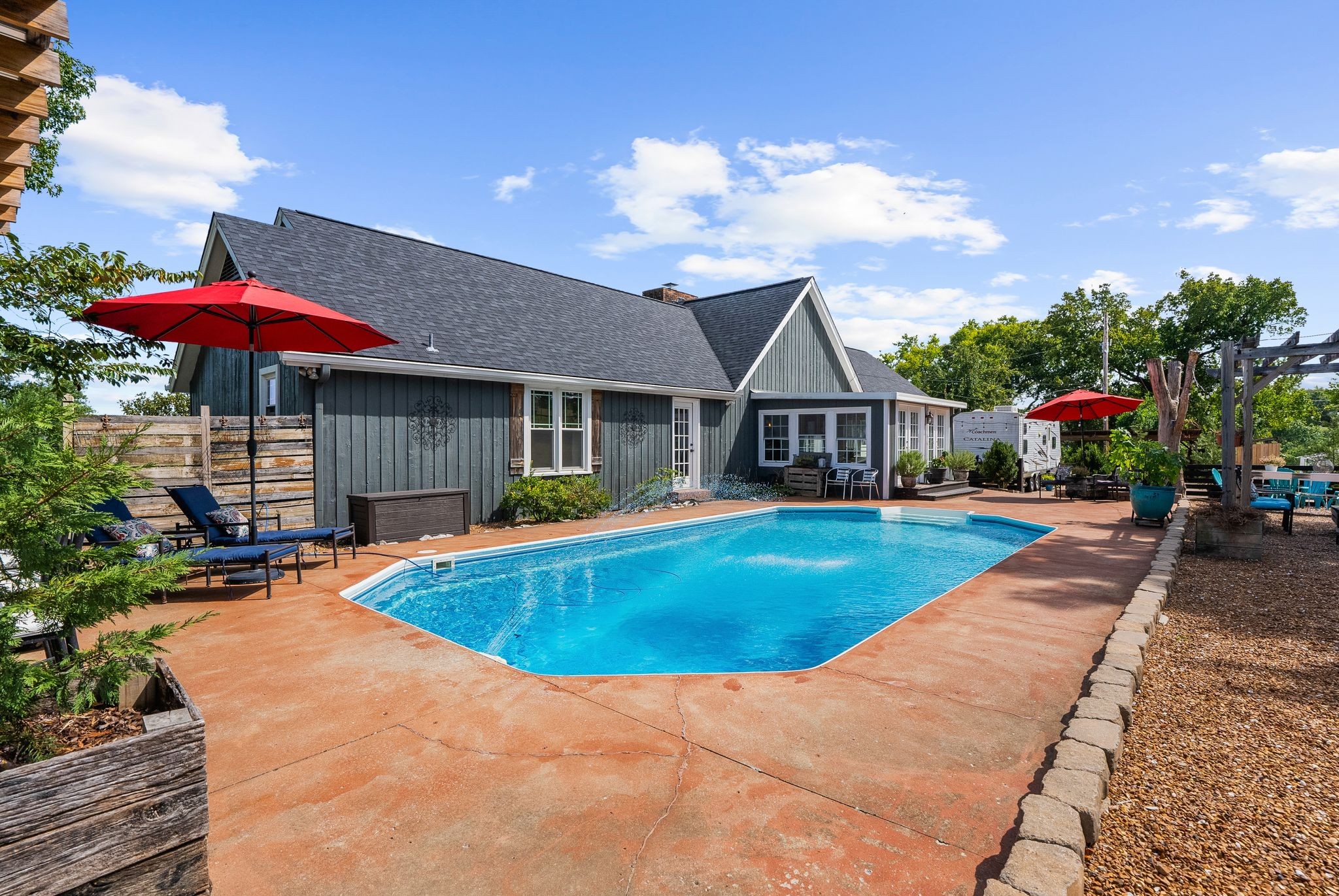 1633 Saundersville Road Hendersonville, TN 37075 - Photo 57 of 71 a view of a house with swimming pool and sitting area