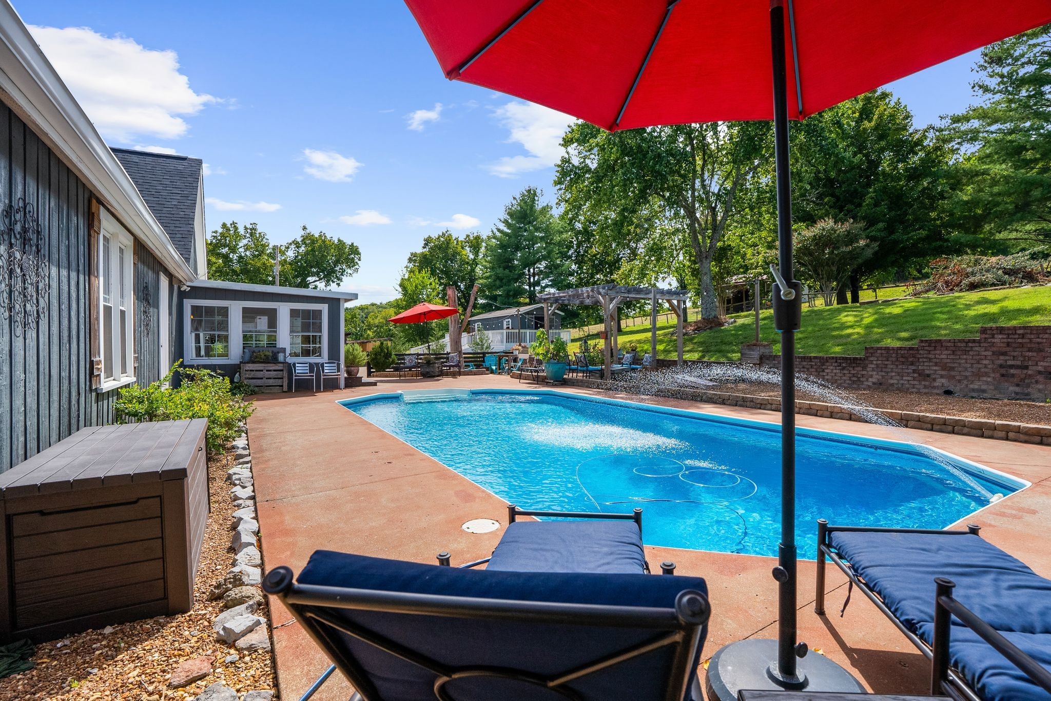 1633 Saundersville Road Hendersonville, TN 37075 - Photo 58 of 71 a view of a swimming pool with a patio