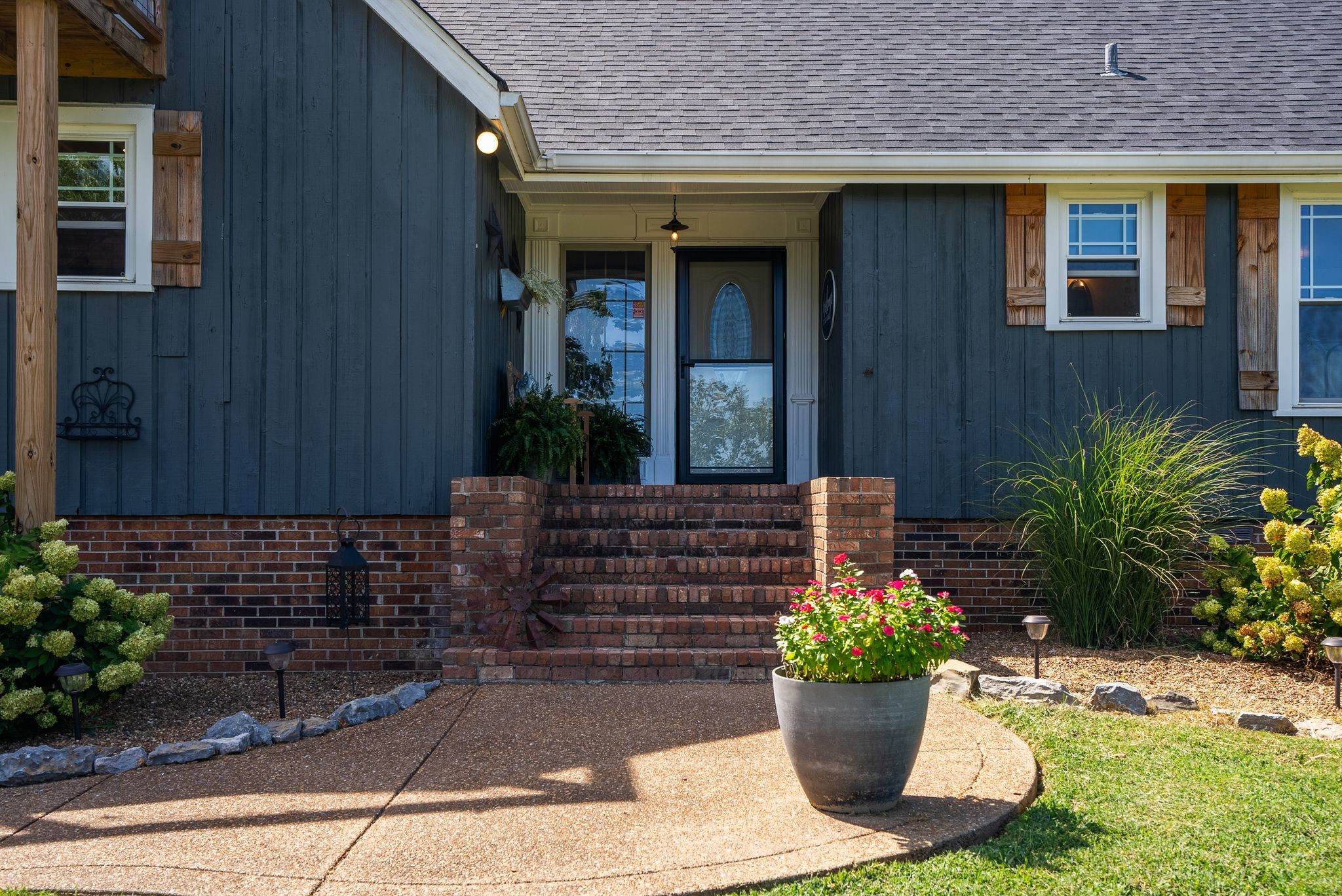 1633 Saundersville Road Hendersonville, TN 37075 - Photo 7 of 71 a view of a house with potted plants