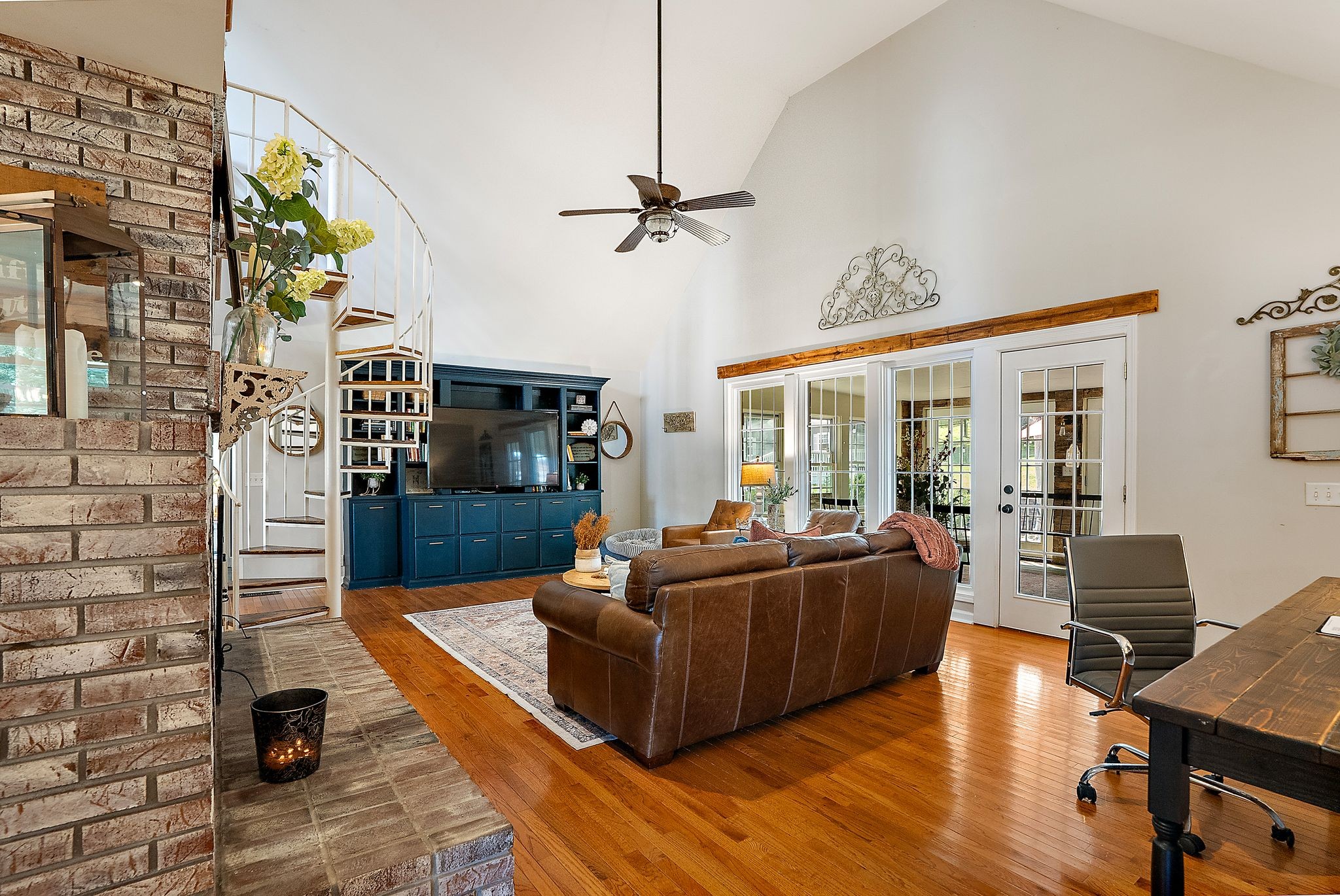 1633 Saundersville Road Hendersonville, TN 37075 - Photo 10 of 71 a living room with furniture floor to ceiling window and wooden floor