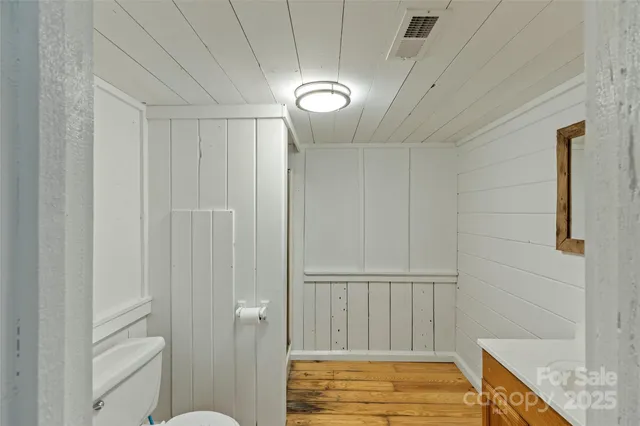 a view of a patio with table and chairs