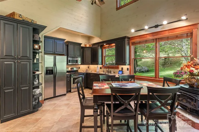 a dining room with furniture and window