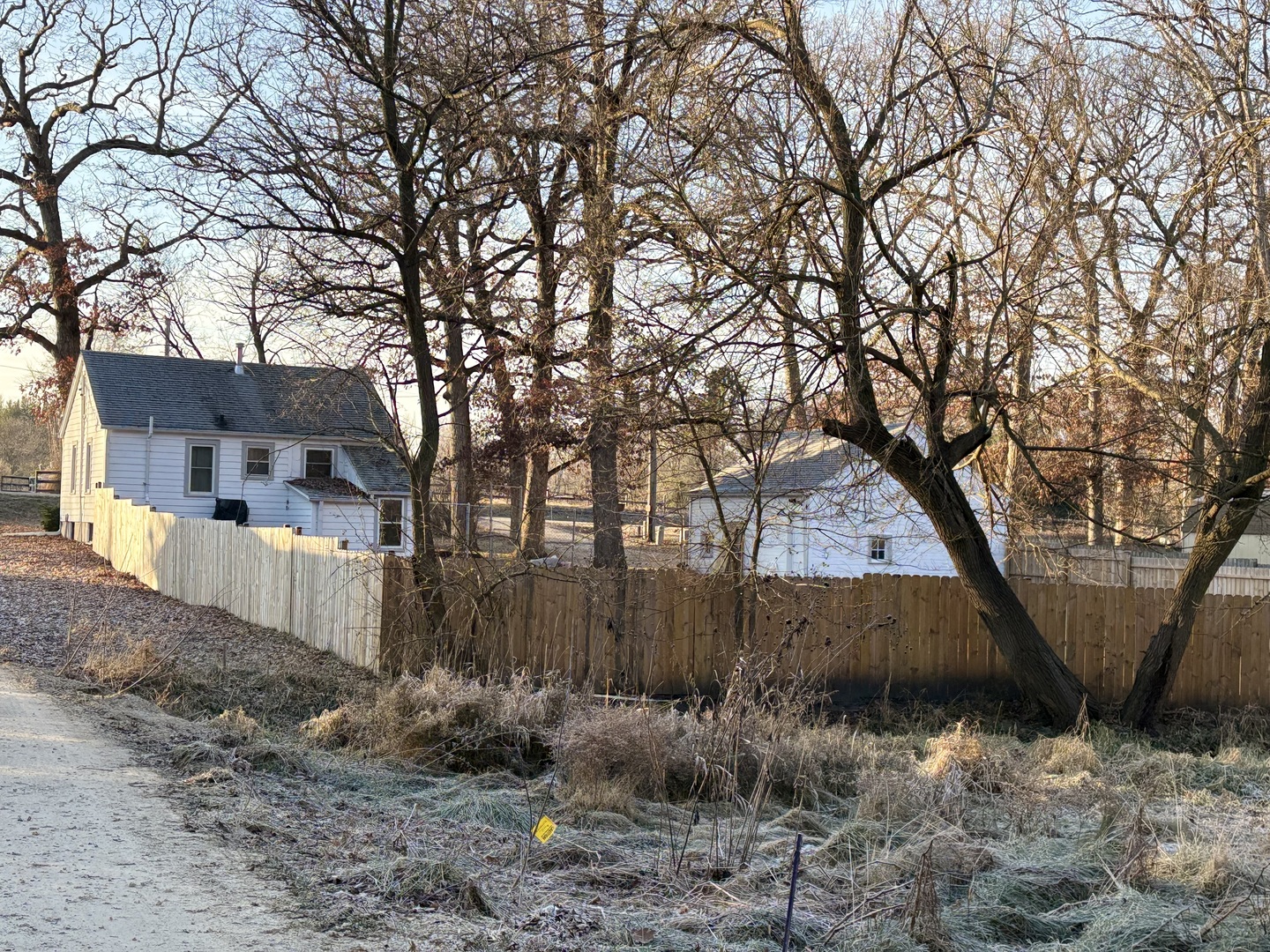 9758 East Flagg Road Rochelle, IL 61068 - Photo 20 of 22 a view of a house with a yard