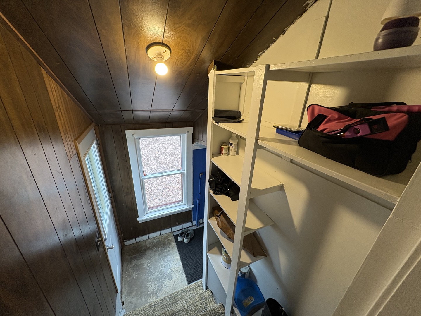 9758 East Flagg Road Rochelle, IL 61068 - Photo 3 of 22 a view of walk in closet with clothes and shoes