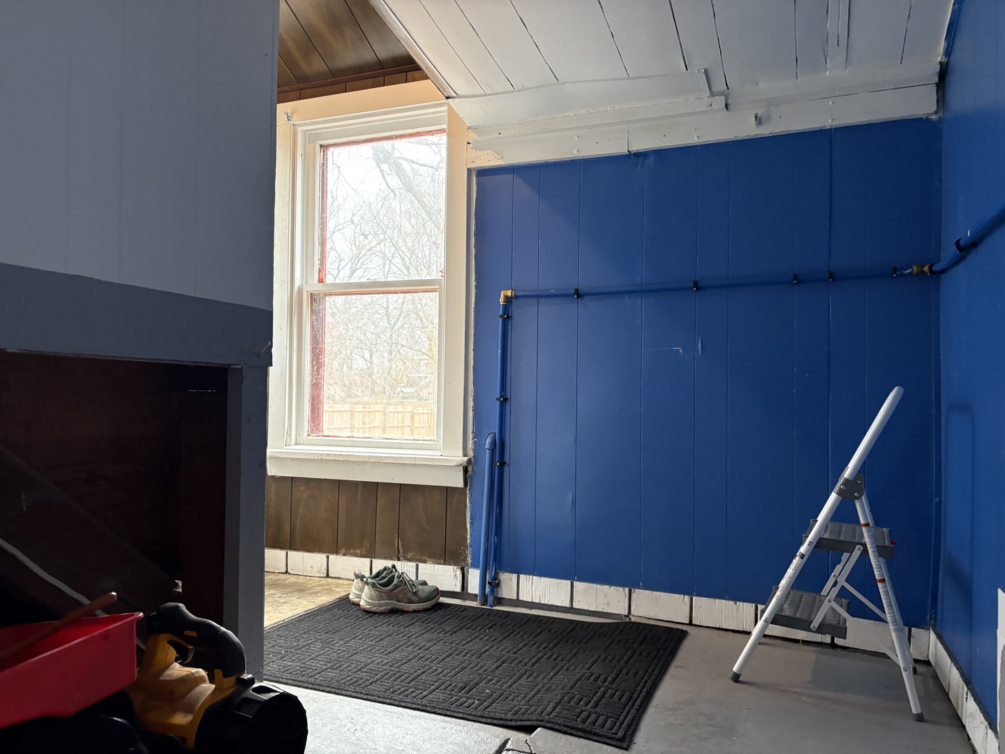 9758 East Flagg Road Rochelle, IL 61068 - Photo 4 of 22 a room with gym equipment and a window
