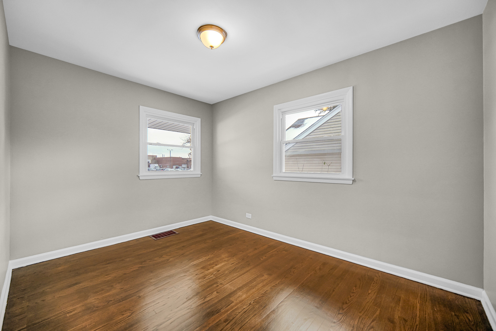 18144 Aberdeen Street Homewood, IL 60430 - Photo 11 of 25 an empty room with a window