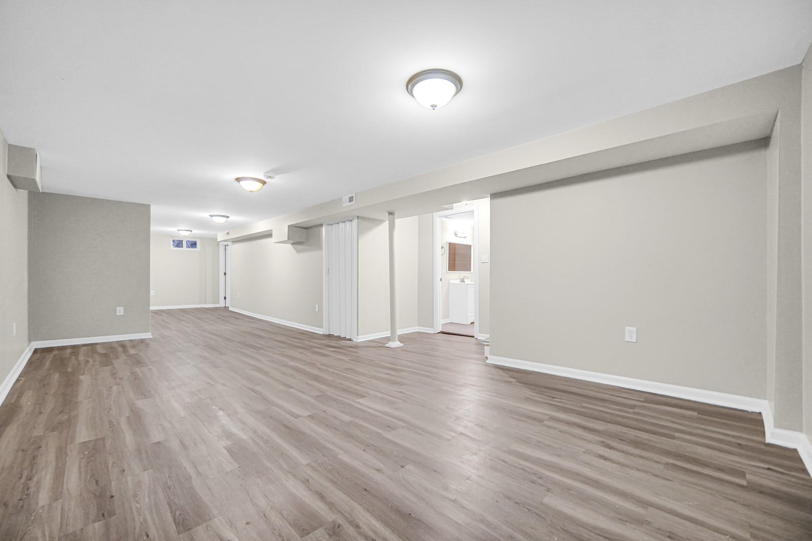 18144 Aberdeen Street Homewood, IL 60430 - Photo 17 of 25 a view of an empty room with wooden floor