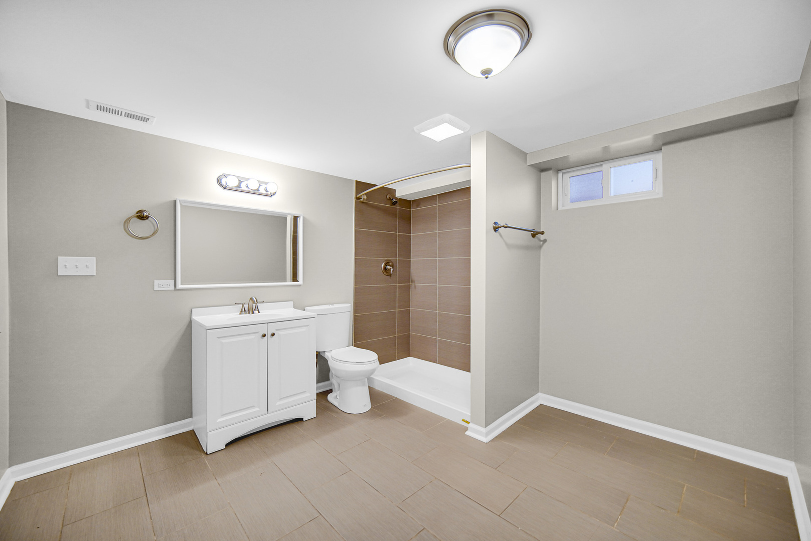18144 Aberdeen Street Homewood, IL 60430 - Photo 20 of 25 a bathroom with a sink a toilet and shower