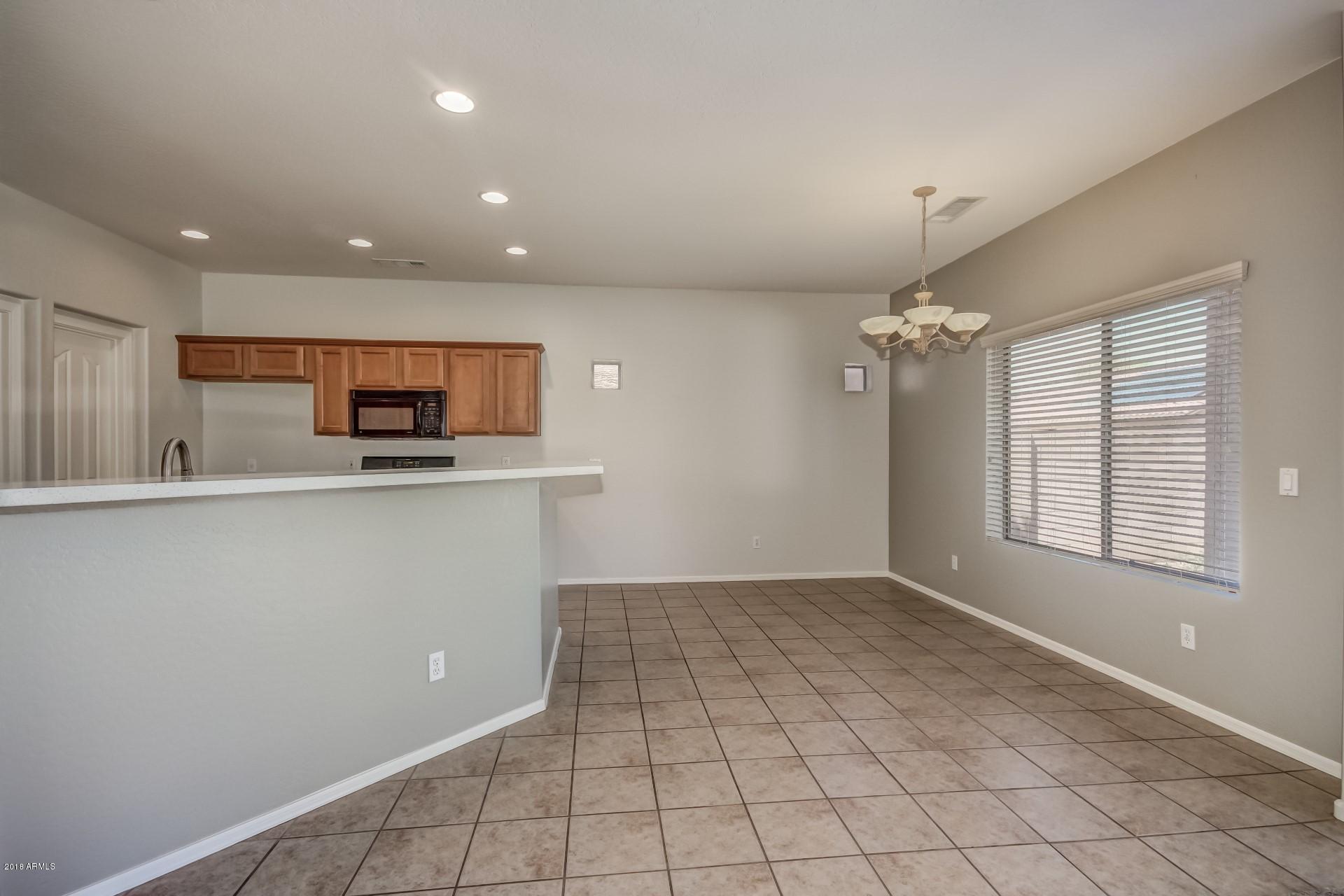 12906 West Bloomfield Road El Mirage, AZ 85335 - Photo 6 of 27 KITCHEN EATING AREA