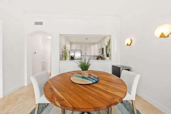 a view of a dining room with furniture