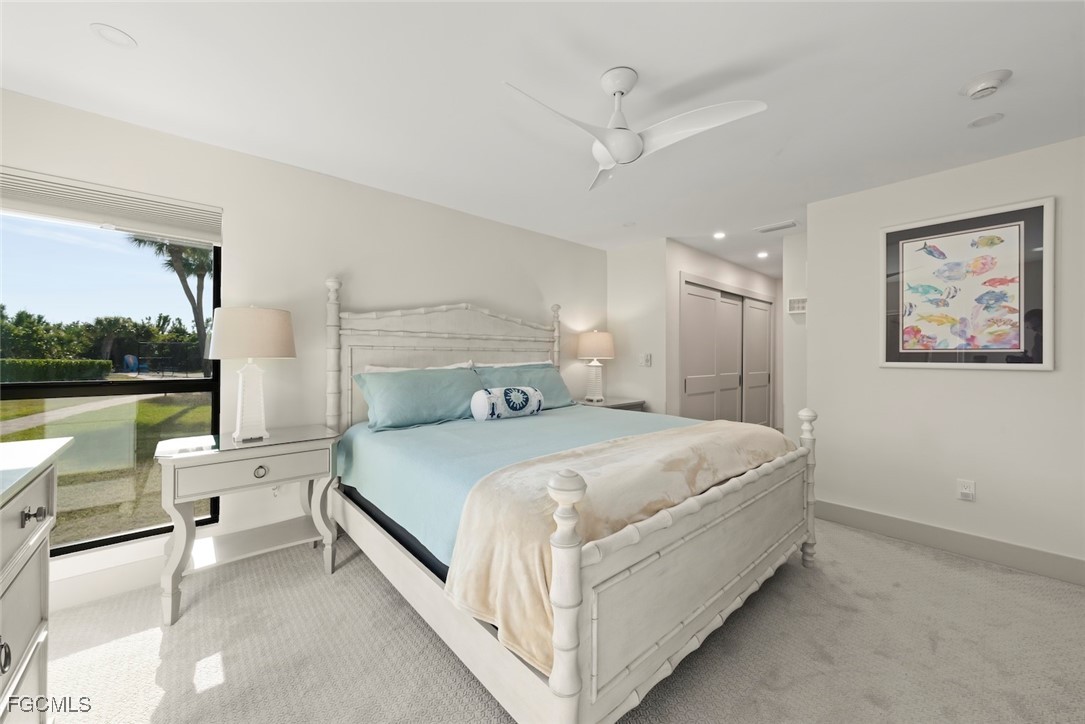 5117 Sea Bell Road, Unit G102 Sanibel, FL 33957 - Photo 23 of 49 a bed room with a bed and a large window