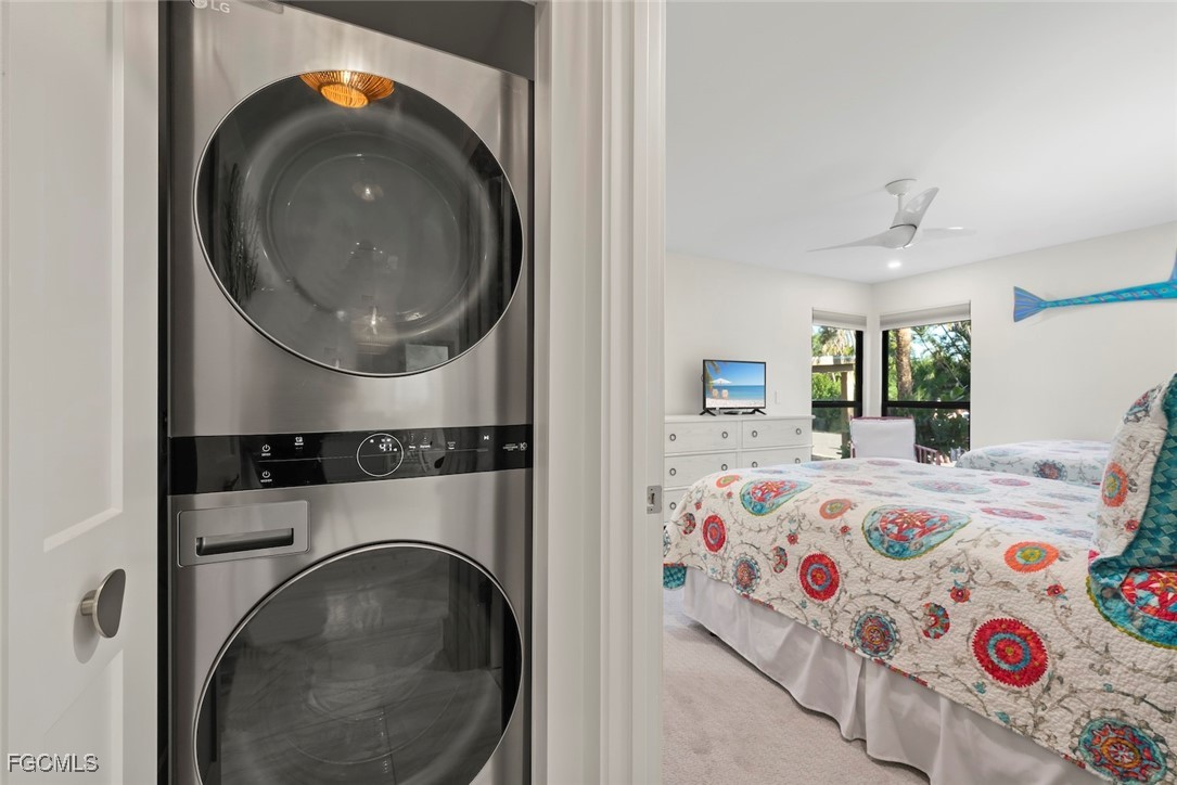 5117 Sea Bell Road, Unit G102 Sanibel, FL 33957 - Photo 34 of 49 a utility room with dryer and washer