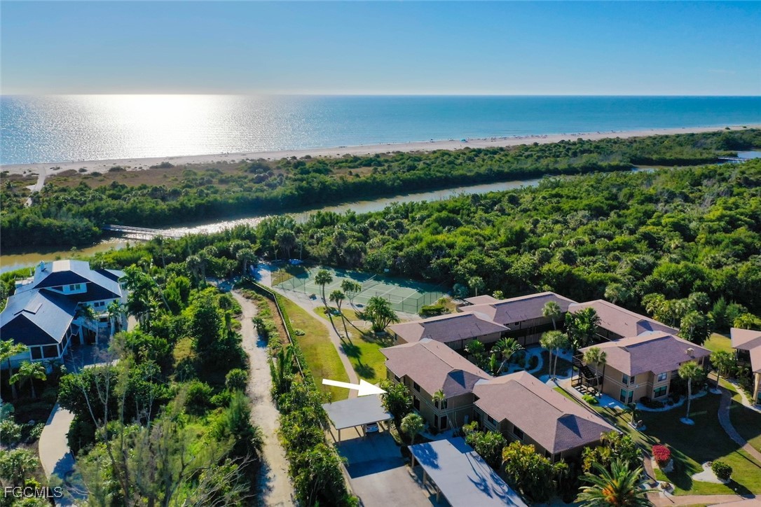 5117 Sea Bell Road, Unit G102 Sanibel, FL 33957 - Photo 44 of 49 an aerial view of house with yard swimming pool and outdoor seating