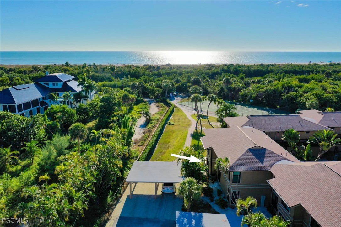 5117 Sea Bell Road, Unit G102 Sanibel, FL 33957 - Photo 45 of 49 an aerial view of house with yard swimming pool and outdoor seating