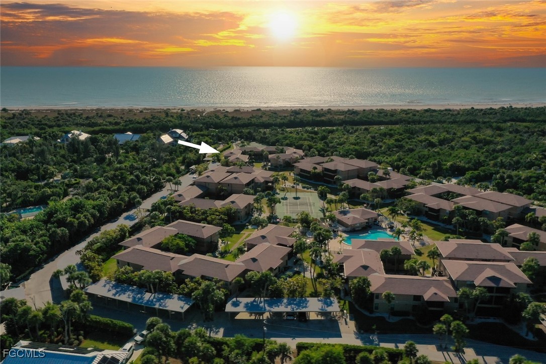 5117 Sea Bell Road, Unit G102 Sanibel, FL 33957 - Photo 49 of 49 an aerial view of residential houses with outdoor space