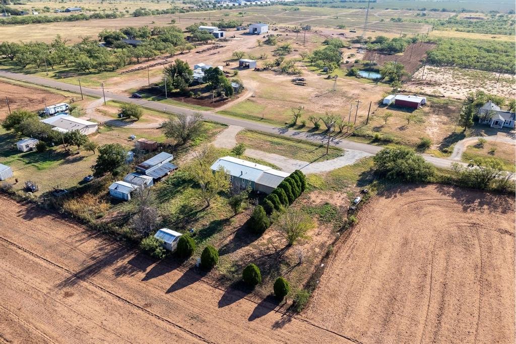 414 Bird Road Merkel, TX 79536 - Photo 13 of 19 an aerial view of residential houses with outdoor space