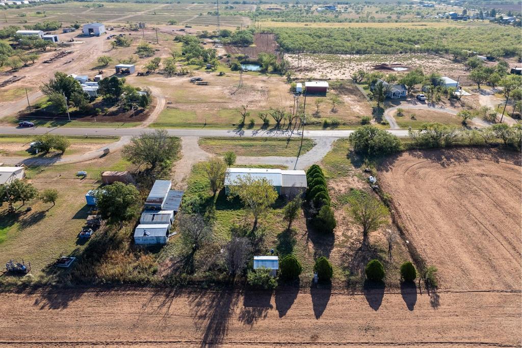 414 Bird Road Merkel, TX 79536 - Photo 14 of 19 an aerial view of residential houses with outdoor space