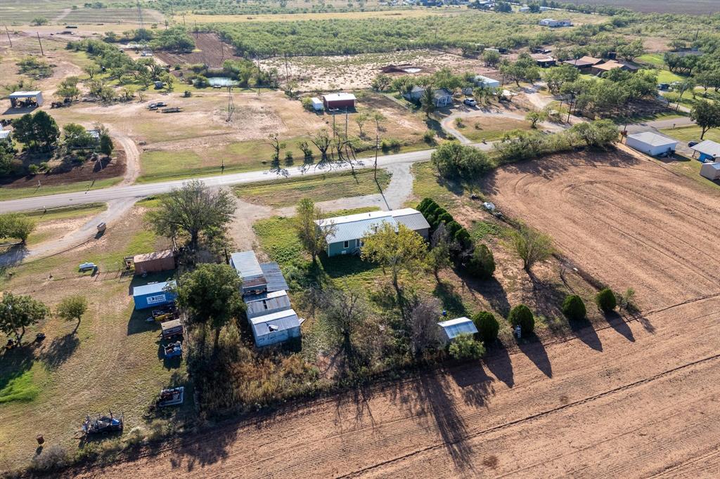 414 Bird Road Merkel, TX 79536 - Photo 15 of 19 an aerial view of residential houses with outdoor space