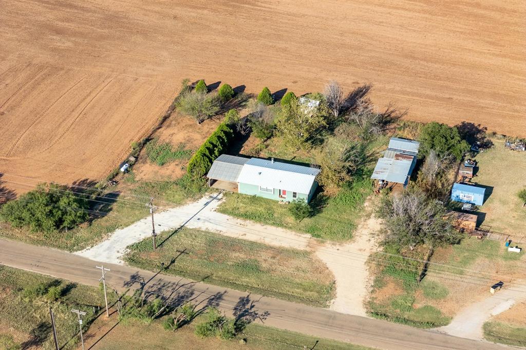 414 Bird Road Merkel, TX 79536 - Photo 19 of 19 an aerial view of a house with a yard
