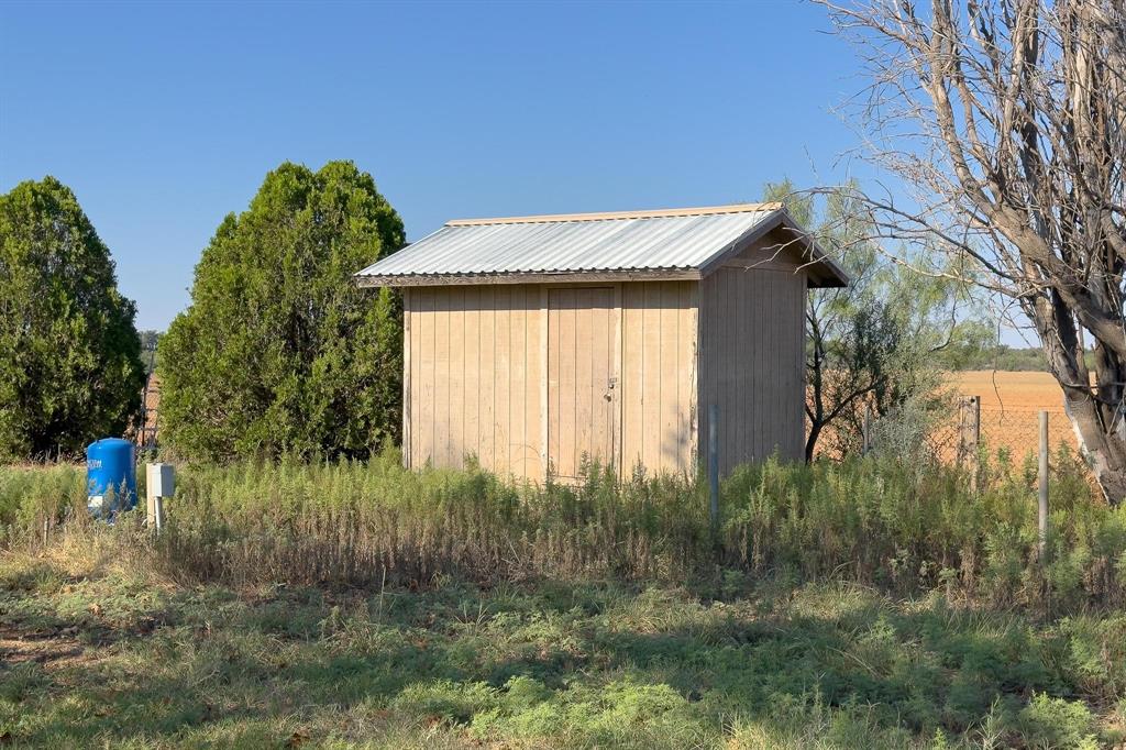 414 Bird Road Merkel, TX 79536 - Photo 5 of 19 a house view with a backyard space