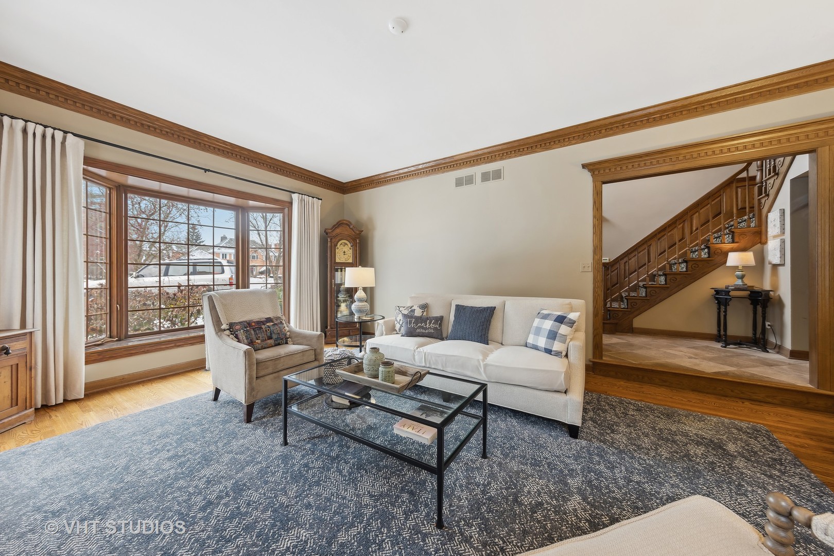 148 Circle Ridge Drive Burr Ridge, IL 60527 - Photo 8 of 71 a living room with furniture and a large window